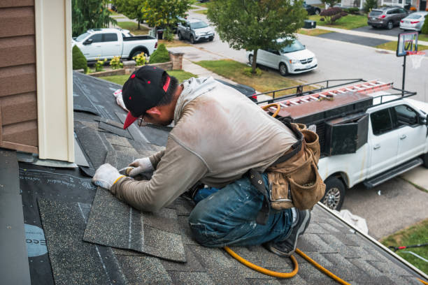 Professional Metal Roofing technician working in Bayport, NY